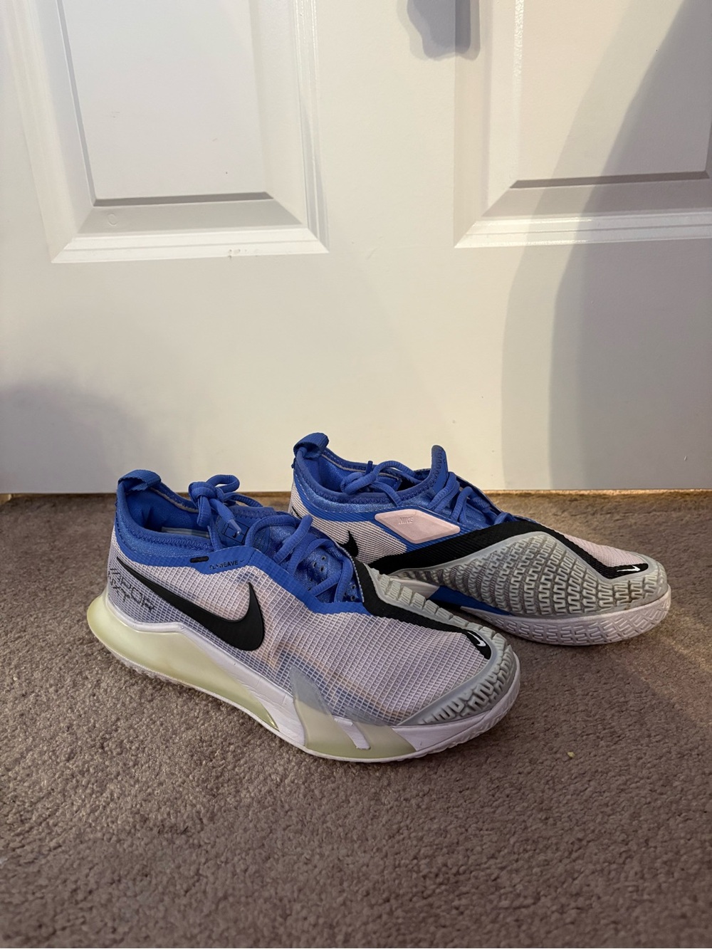 Nike Blue, Purple, Mint, and Black Athletic Sneakers